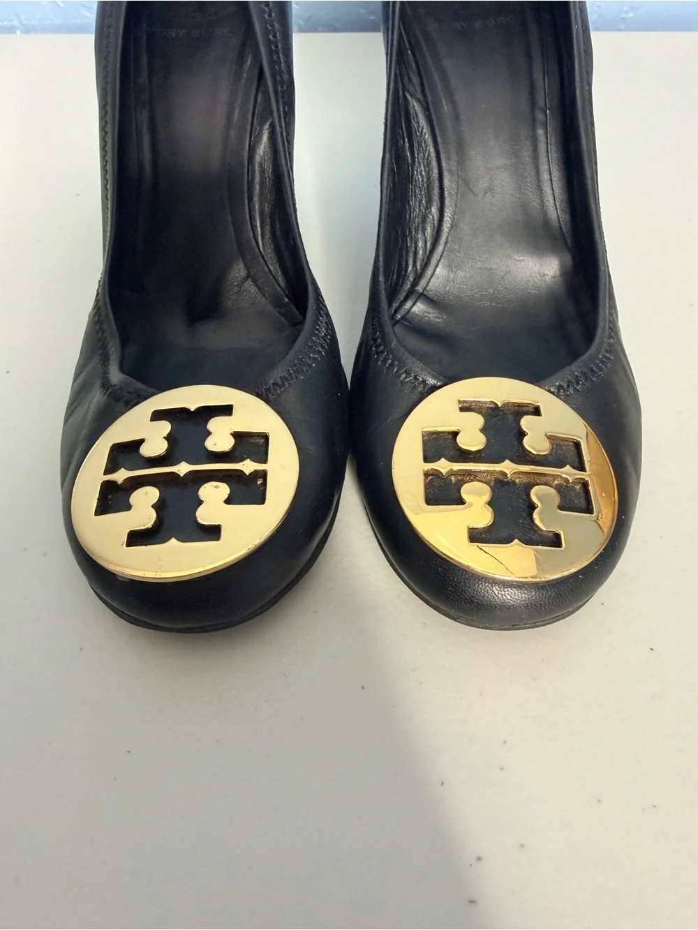 Tory Burch Sophia wedge pumps black leather with large gold logo at toe. Women 9